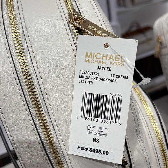Michael Kors Jaycee Medium Pebbled Leather Backpack
Light Cream - Picture 9 of 16